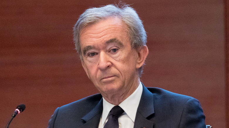 Bernard Arnault raised eyebrows microphone