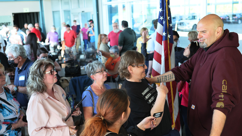 John Fetterman greeting people