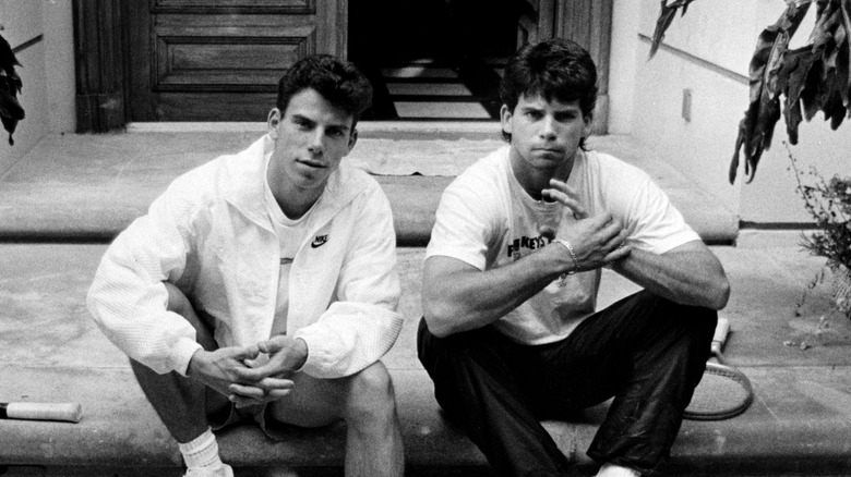 erik and lyle menendez sitting on stoop