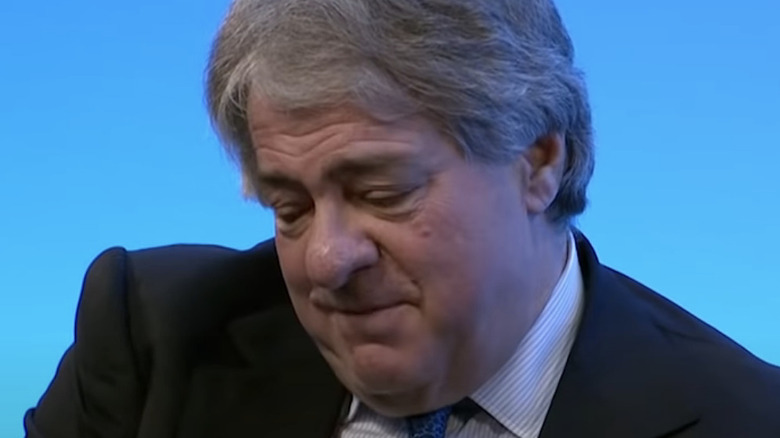 Leon Black looking down