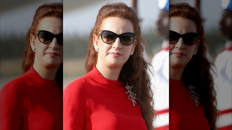 lalla salma red top wearing sunglasses