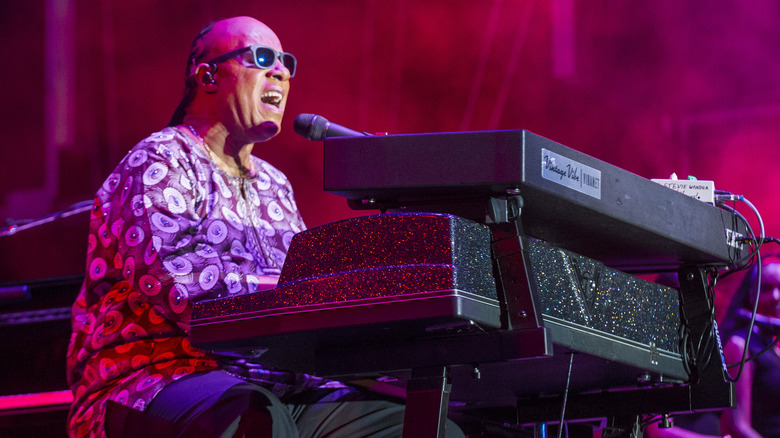 Stevie Wonder performing on stage