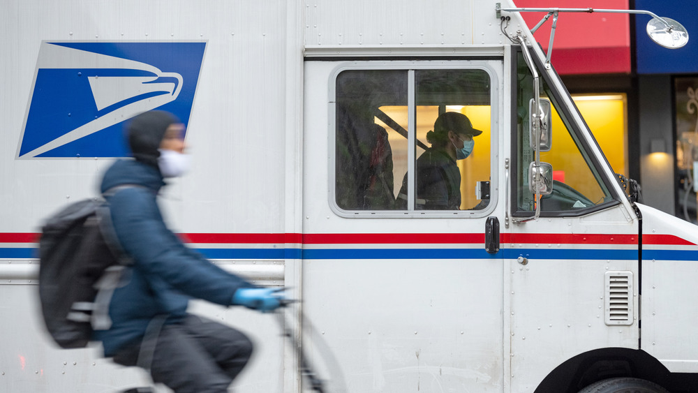 Post Office truck and cyclist