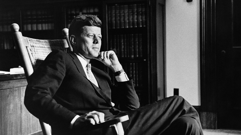 JFK hand chin sitting oval office