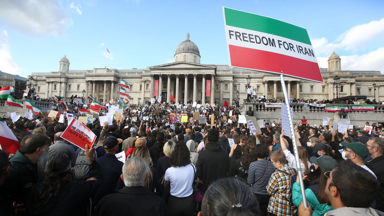 people attending protest in London