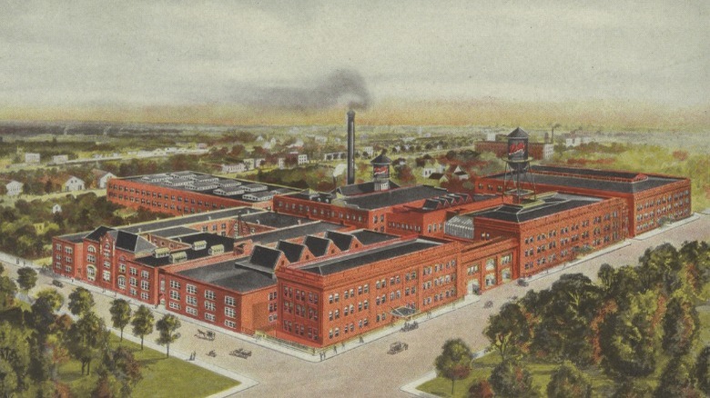 Painting of Eli Lilly red building with smokestack