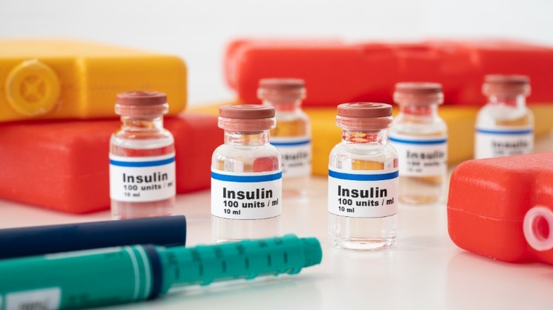Glass bottles of insulin red cooler packs