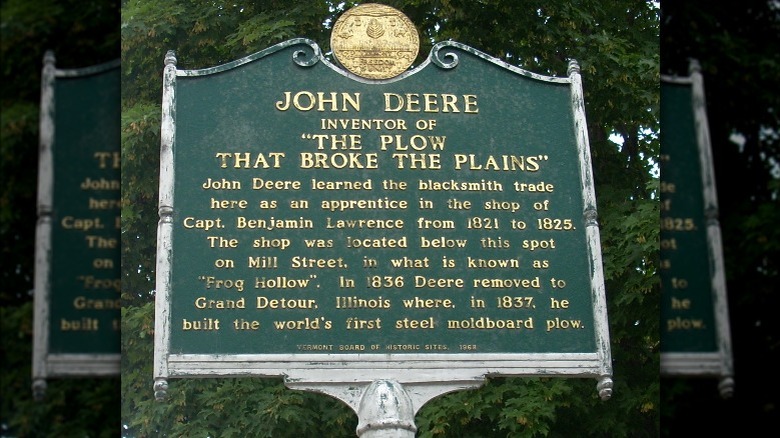 A historical marker marking the start of John Deere's career, located in Middlebury, Vermont
