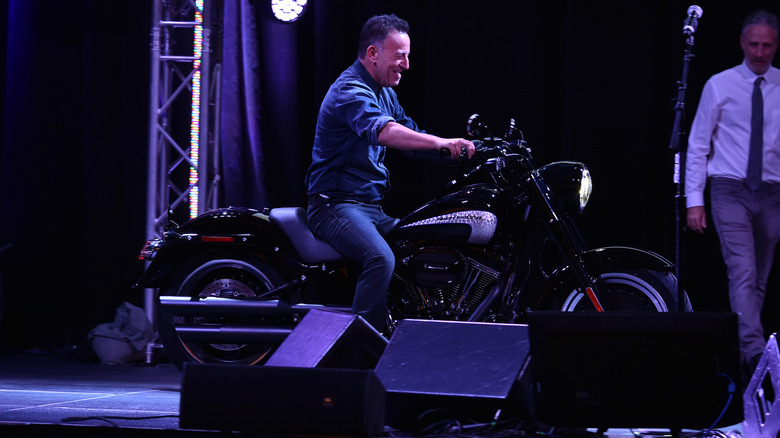 Bruce Springsteen on stage on motorcycle