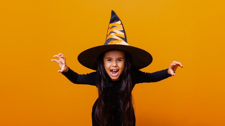 Child in Witch Costume