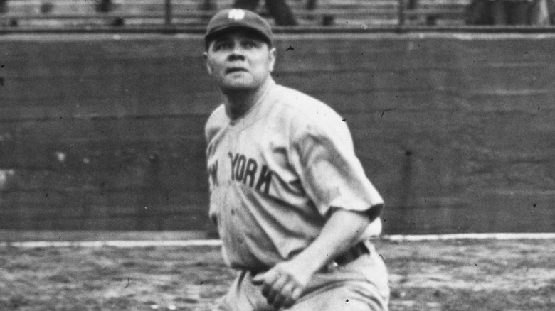 Babe Ruth fielding a ball