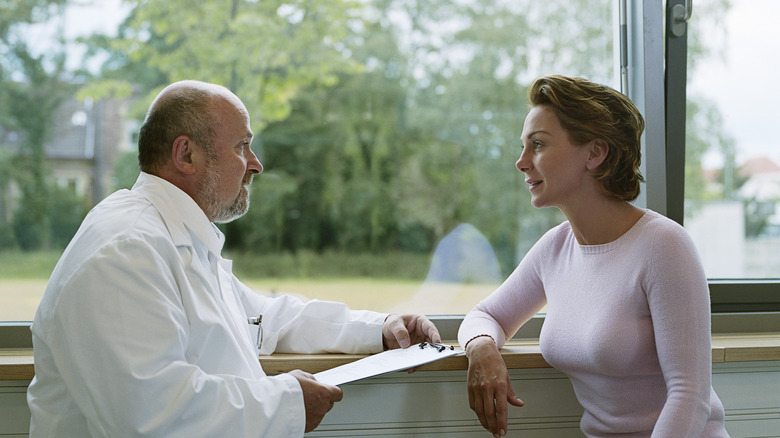 Doctor with patient