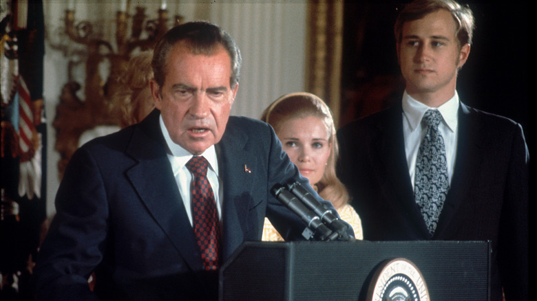 Nixon in front of microphones