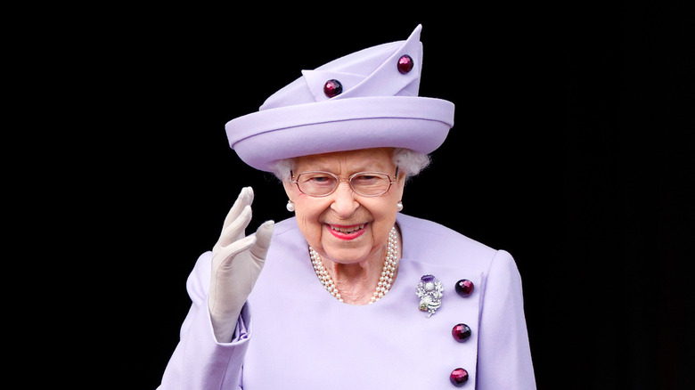 Queen Elizabeth II purple outfit