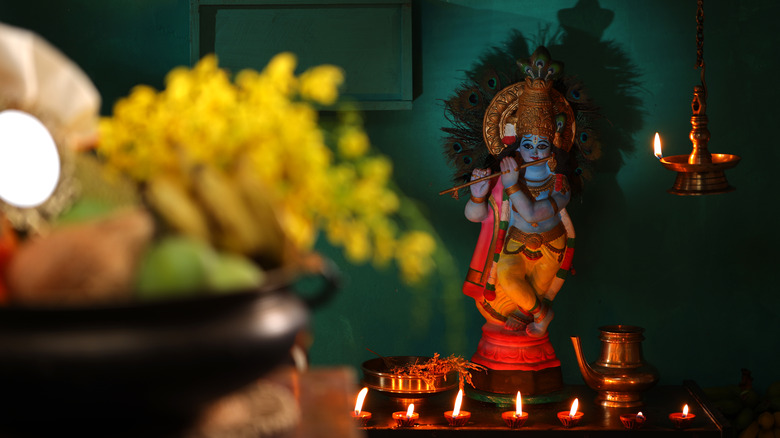 Krishna statue with offerings