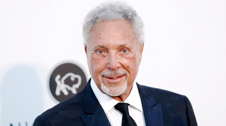 Tom Jones wearing suit