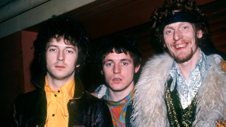 Cream posing for band photo