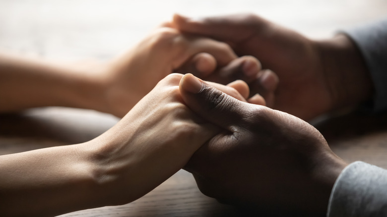 couple holding hands