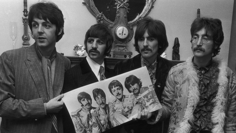 The Beatles with a Sgt. Pepper's album