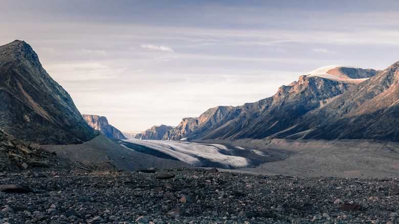 Photo of mountain ranges in remote arctic valley