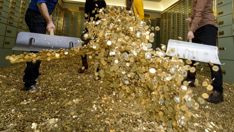 piles of money gold coins