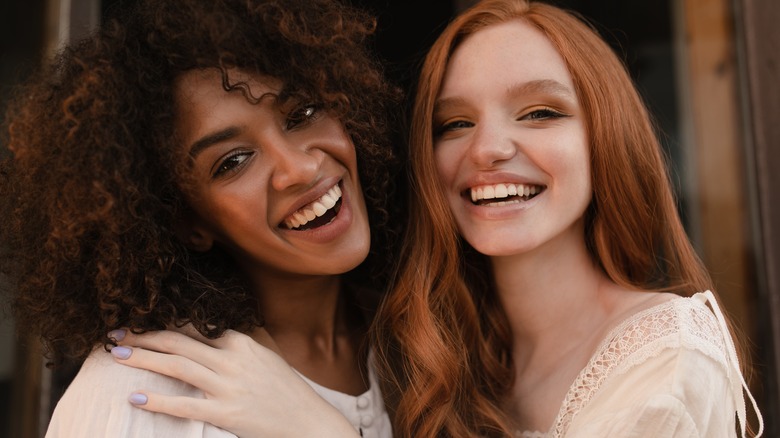 red and brown haired women