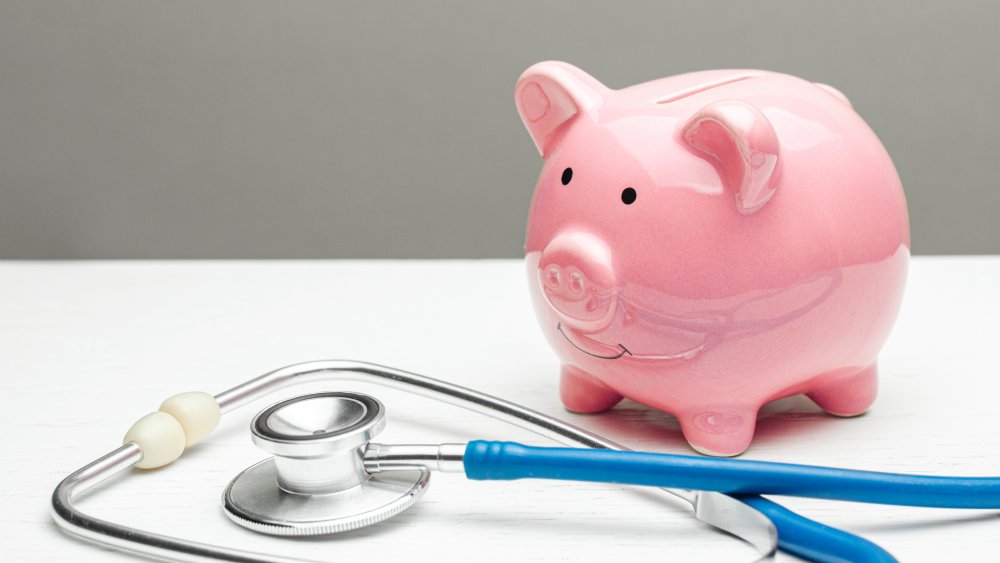 Piggy bank with stethoscope