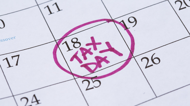 calendar with "tax day" circled in purple ink