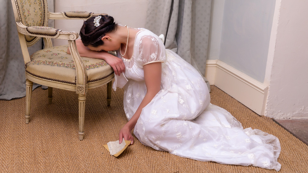 Sad woman in regency dress