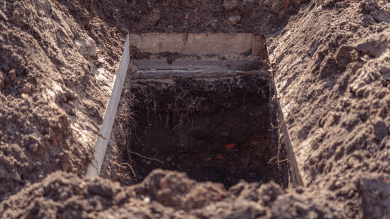 Open, dug grave