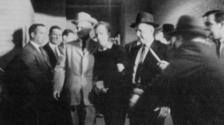 lee harvey oswald about to get shot by jack ruby