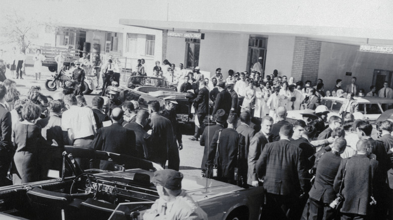 crowd gathering outside parkland hospital where JFK was treated