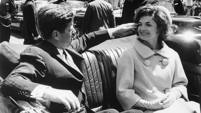 john f. kennedy moves body to face jacqueline kennedy during trip to dallas