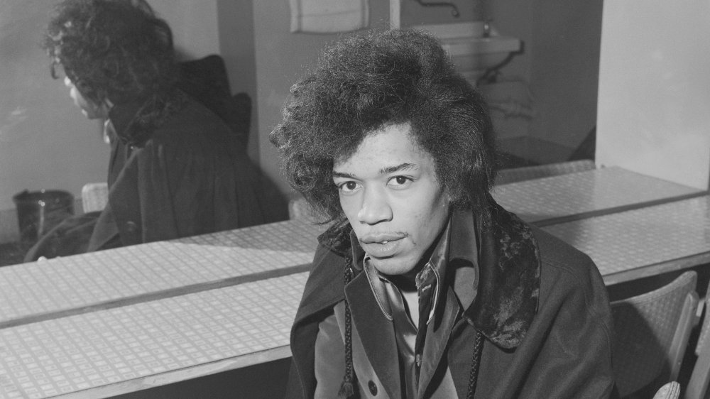 Jimi Hendrix posing for a photo