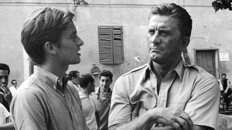 Michael Douglas standing next to Kirk Douglas