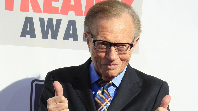 Larry King thumbs up