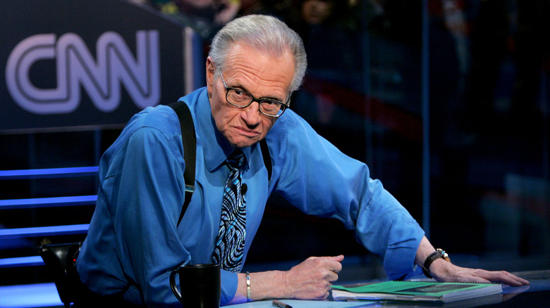 Larry King blue shirt