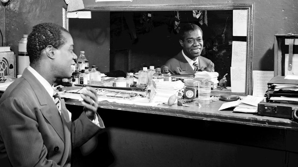 A portrait of Louis Armstrong in his dressing room