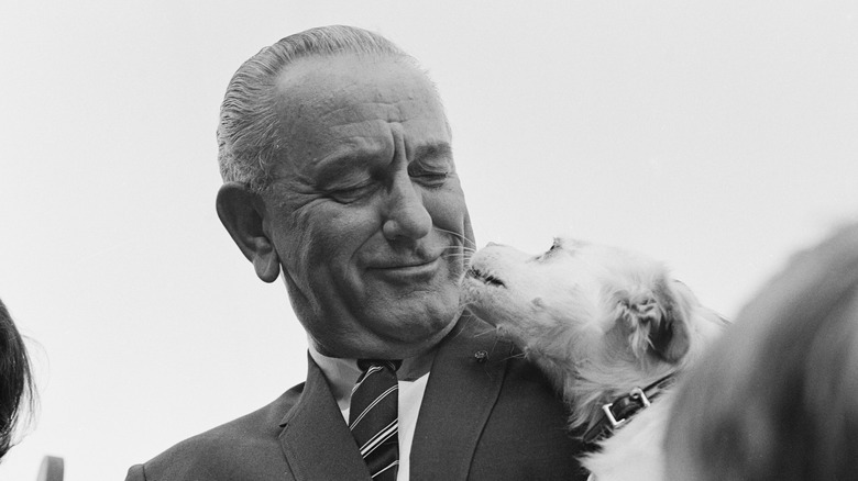 Lyndon Johnson with his dog, Yuki