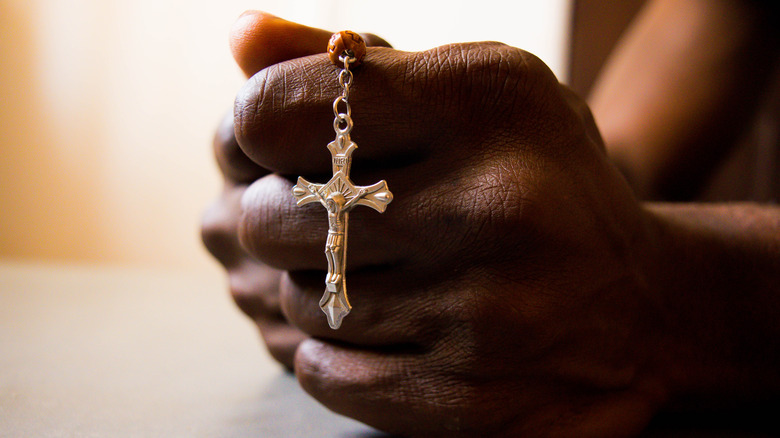 Man holding a rosary