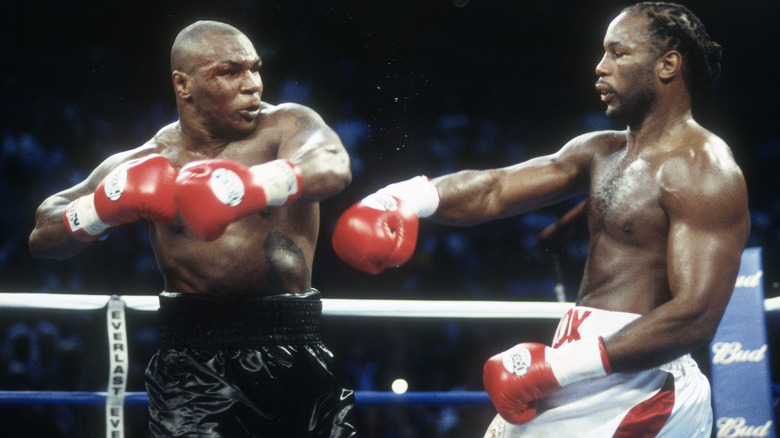 Mike Tyson flinching from Lennox Lewis