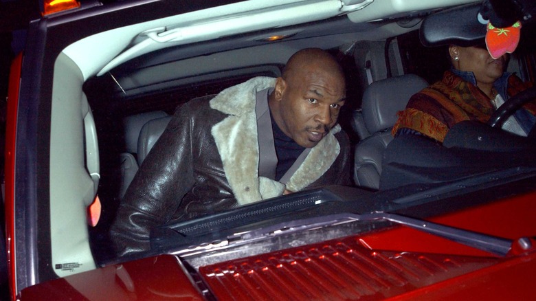 Mike Tyson getting into his Hummer
