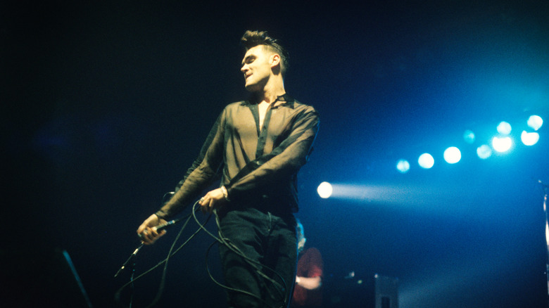 Morrissey on stage with mic