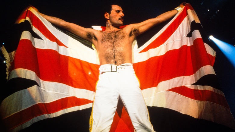 Freddie Mercury holding U.K. flag