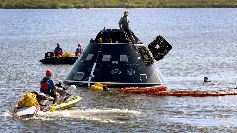 Orion module being recovered from sea