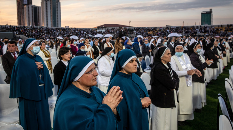 Crowd of nuns at outdoor service