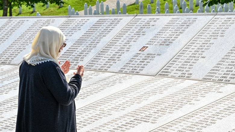 Woman visits memorial