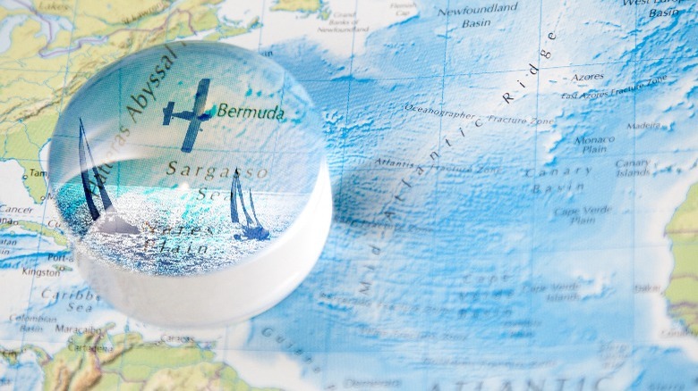 Plane flying over Bermuda Triangle map