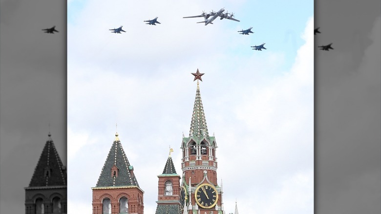 Airplanes flying over Russian building