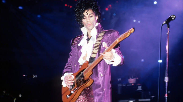 Prince playing guitar